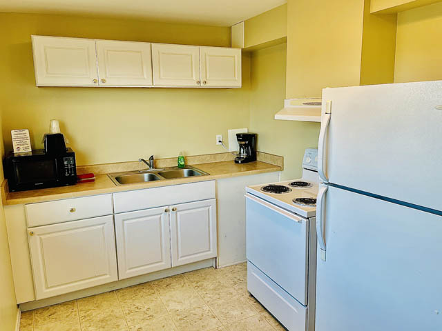 Double Queen DLX Kitchenette Room at Sage-N-Sand Motel